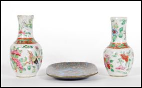 A pair of 18th / 19th Century miniature Chinese ceramic vases decorated with birds and fauna