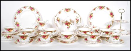 A Royal Albert Old Country Roses part tea set to include creamer jug, sugar bowl, cups, saucers,
