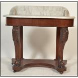 A Victorian 19th century mahogany and marble duchess console table. Raised on bun feet with lower