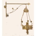 A 19th Century Gothic brass wall light with original bracket having Gothic pierced fretwork and