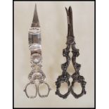 A pair of late 19th / early 20th Century William Hutton & Sons silver plated grape scissors the