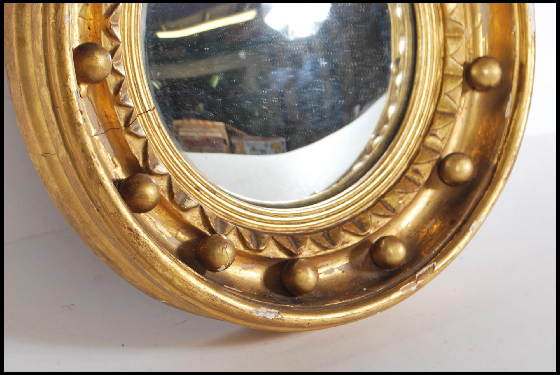 A 19th century gilt wood and gesso convex porthole mirror applied with eagle atop. The circular - Bild 2 aus 4