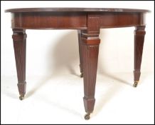 A  19th century good quality Victorian mahogany extending dining table. The oval top complete with