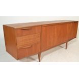 A.H. McIntosh Of Kirkcaldy - A 1960's retro vintage teak wood sideboard credenza . The unit having a