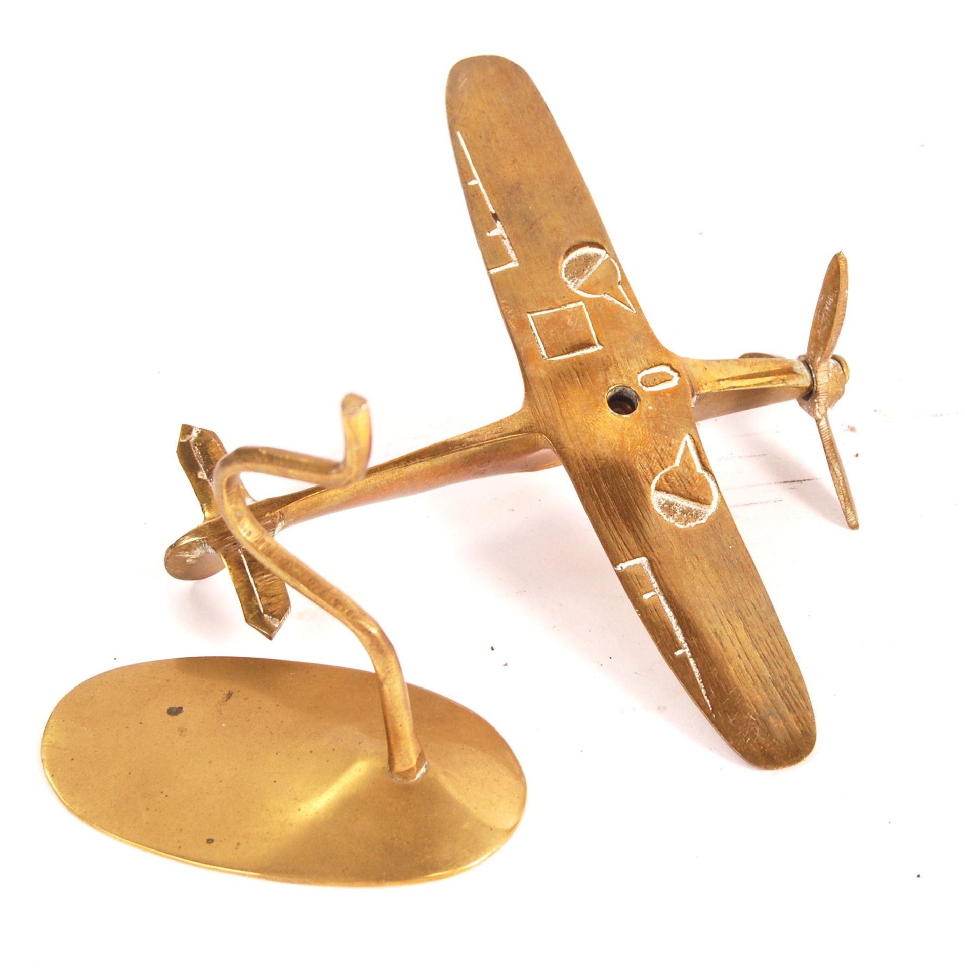 A WWII Second World War era apprentice piece brass model of a Spitfire. Shaped brass stand, with - Bild 4 aus 4