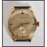 A vintage gentleman's Peerex antimagnetic wrist watch a round champagne dial having baton markings