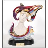 An unusual Portugese Artiscatas Turis porcelain sculpture bust of a lady in traditional Portugese