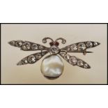 A late 19th / early 20th Century Victorian silver white metal bug brooch set with white paste