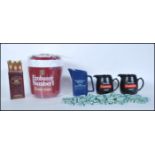 A collection of 20th century breweriana items to include Embassy Number 1 Ice bucket, Have A