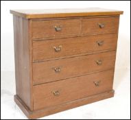 A Victorian 19th century scrumble painted chest of drawer. Raised on a plinth base with 2 short over