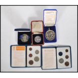 A silver Edward Prince of Wales coin in its original box together with two Britain's First Decimal