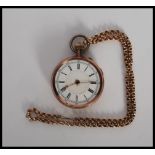 A 9ct gold hunter pocket watch having enamel face with roman numerals to the chapter, crown winder
