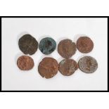 A group of copper Roman coins believed to be hammered with Antoninus Pius (138-161 AD), possibly