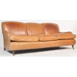 A stunning 20th century retro vintage Howard style brown leather three seat sofa settee having a