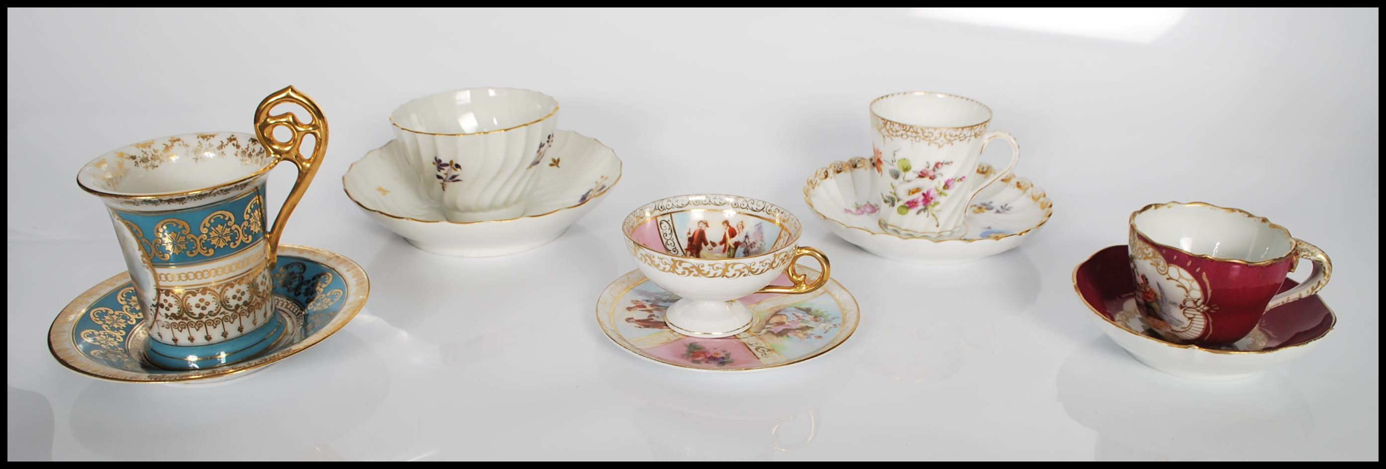 A collection of five late 19th / early 20th Century cabinet cups and saucers to include a hand - Image 2 of 16