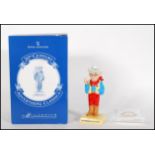 A Royal Doulton ceramic advertising figure for ' The Milkybar Kid , AC7, limited edition no. 523 /