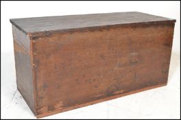 A 19th Century Victorian pine blanket box chest, hinged top with lock to front, carry handles to
