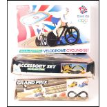 THREE BOXED SCALEXTRIC SLOT CAR RACING SETS