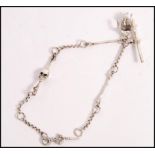 A stamped 925 silver fob watch chain having skeleton accent links and T bar. Weight 21.7g. Chain