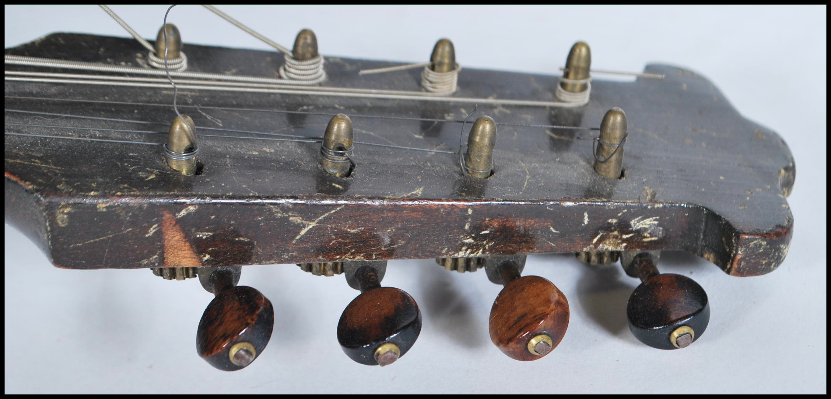 An early 20th Century Mandolin having mother of pearl inlaid fingerboard with bone and tortoiseshell - Image 3 of 7