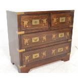 A 20th century antique style mahogany campaign chest of drawers. The chest with brass bindings and