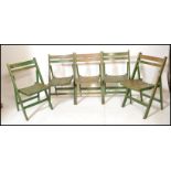 A set of five vintage village hall / garden folding dispersal chairs, slated seat pads and back