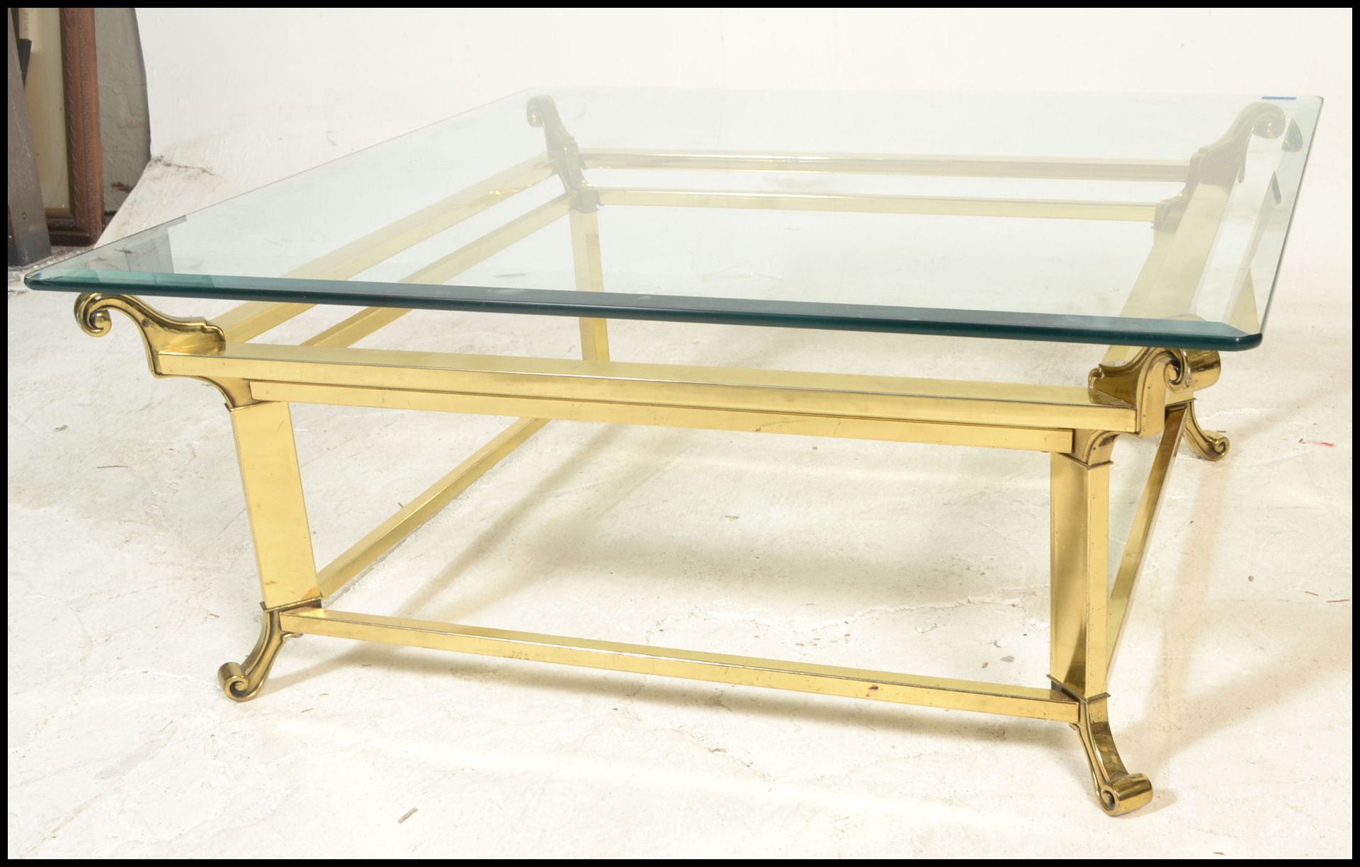 A 20th Century brass and glass top Italian design coffee table of square form raised on scroll - Bild 2 aus 5