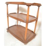 A vintage 20th century Ercol Golden Dawn 3 tier bu