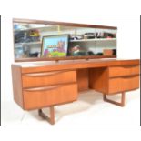 A 1970's teak wood dressing table in the manner of Mogens Kolo / EON - Elliotts of Newbury. The teak