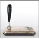An unusual Italian silver hallmarked 925 pen stand, in relief floral spray with bakelite pen
