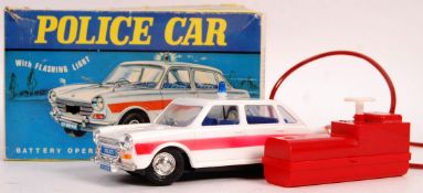 BOXED MARX TOYS POLICE CAR WITH FLASHING LIGHT