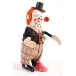 RARE 1940'S SCHUCO CLOCKWORK CLOWN WITH JUGGLING BALLS