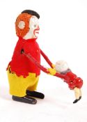 SCHUCO 1930'S CLOCKWORK CLOWN WITH ACROBATIC MOUSE