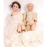 TWO ANTIQUE DOLLS - GERMAN MADE BISQUE HEADED ETC