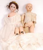 TWO ANTIQUE DOLLS - GERMAN MADE BISQUE HEADED ETC