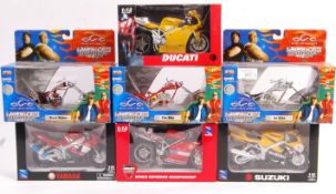 COLLECTION OF SEVEN EX SHOP STOCK LARGE SCALE MOTORBIKES