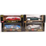 FOUR BOXED 1/18 SCALE DIECAST MODEL CARS