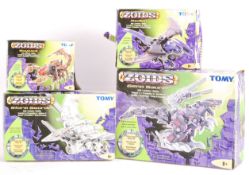 COLLECTION OF VINTAGE ZOIDS ACTION FIGURES / BOXED