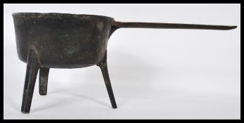 A 18th Century Georgian bronze skillet pan raised