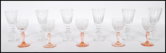 A collection of early 20th century wine glasses /