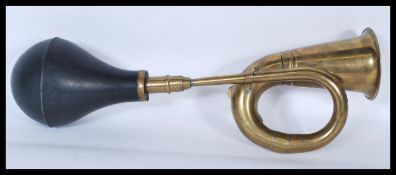 A early 20th Century vintage brass and rubber side