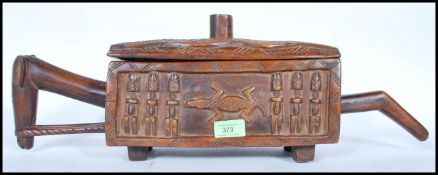 A Dogon Ceremonial Wood chest of rounded rectangul