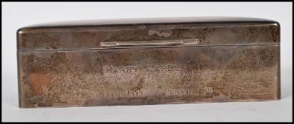 A silver hallmarked desk top cigarette case by Wal