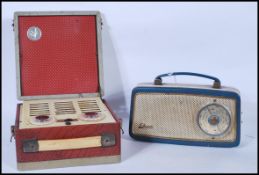 A vintage 20th Century cased Vidor portable radio