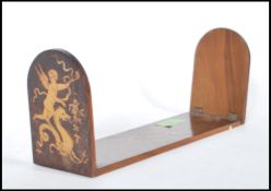 A Sorrento marquetry book slide / stand having two