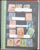 A small stamp album containing stamps from all aro