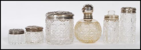 A group of early 20th Century silver topped and cu