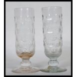 A pair of Georgian drinking glasses having cylindr