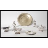 A silver plated rococo style table condiment set c