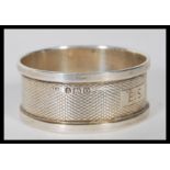 A collection of silver napkin rings to include an